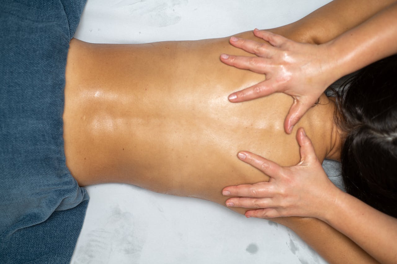 Professional massage technique for relaxing and soothing muscles.